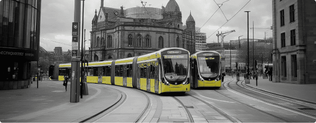 Leeds 18 Yellow trams in urban setting